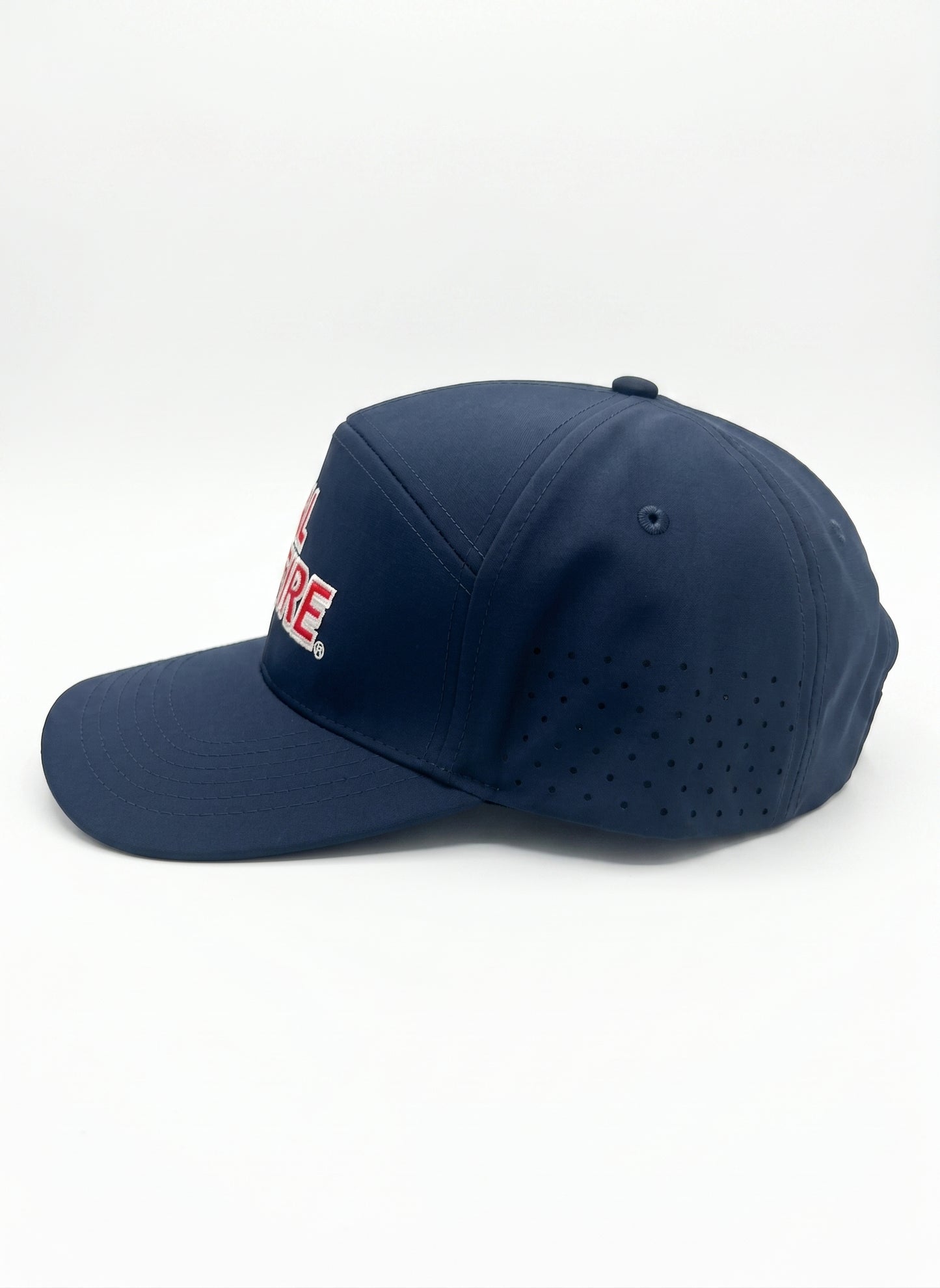 7 Panel Dome Athletic Hat in midnight navy with red CAL FIRE text - side angle view displaying dome shape and athletic construction