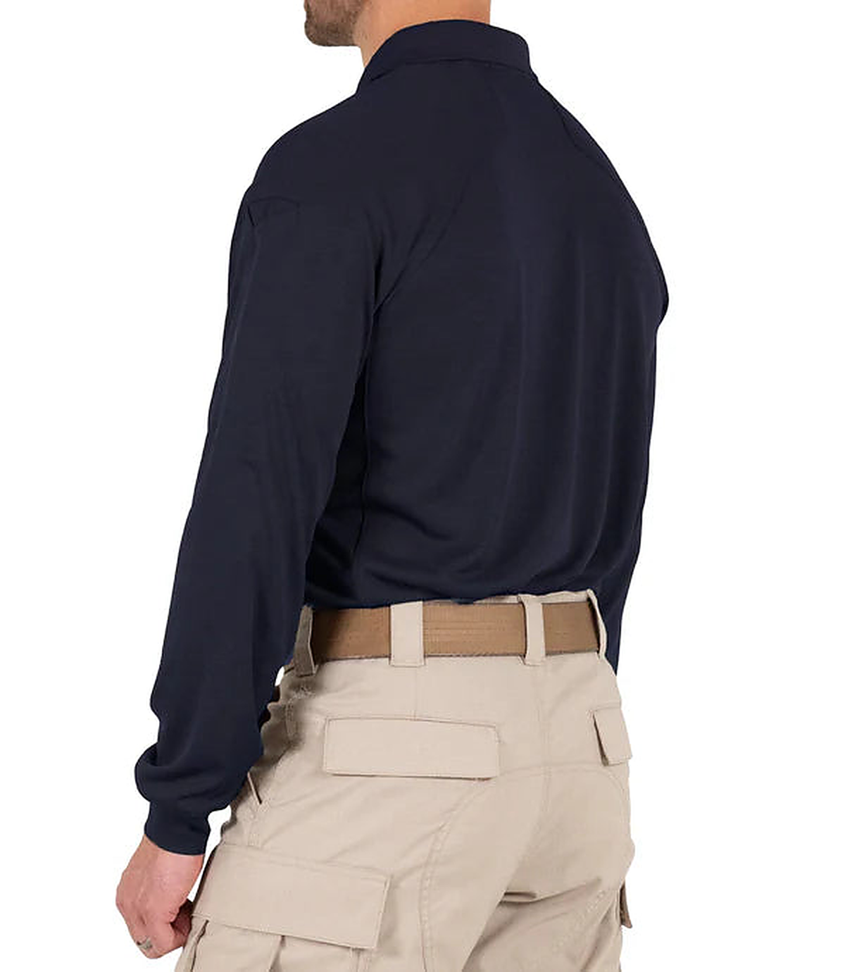 Model in a rear side view wearing the navy long-sleeve polo, showing the upper-arm sleeve pocket and khaki tactical pants.