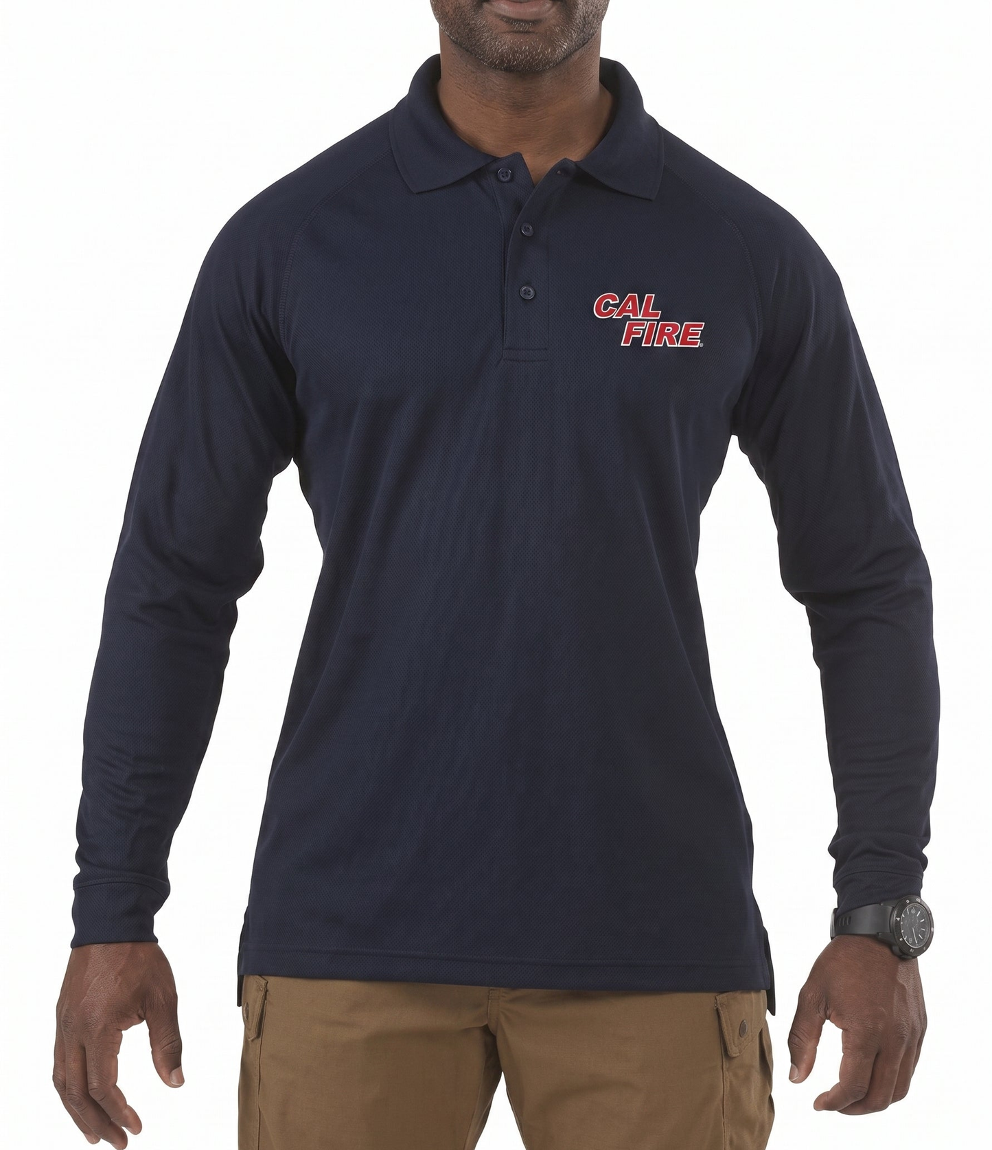 Model wearing the navy 5.11 performance long-sleeve polo with the red CAL FIRE wordmark on the left chest, paired with coyote-brown tactical pants.