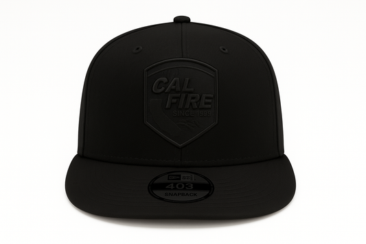 New Era 403 Snapback Hat in solid black with blacked-out CAL FIRE shield logo patch - front view showing flat bill design and structured 6-panel construction with tonal embroidery