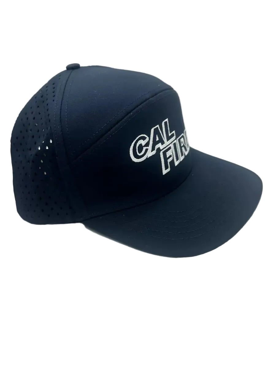 Midnight navy CAL FIRE 7-panel performance hat, angled view with the white CAL FIRE wordmark and laser-perforated vent panels.