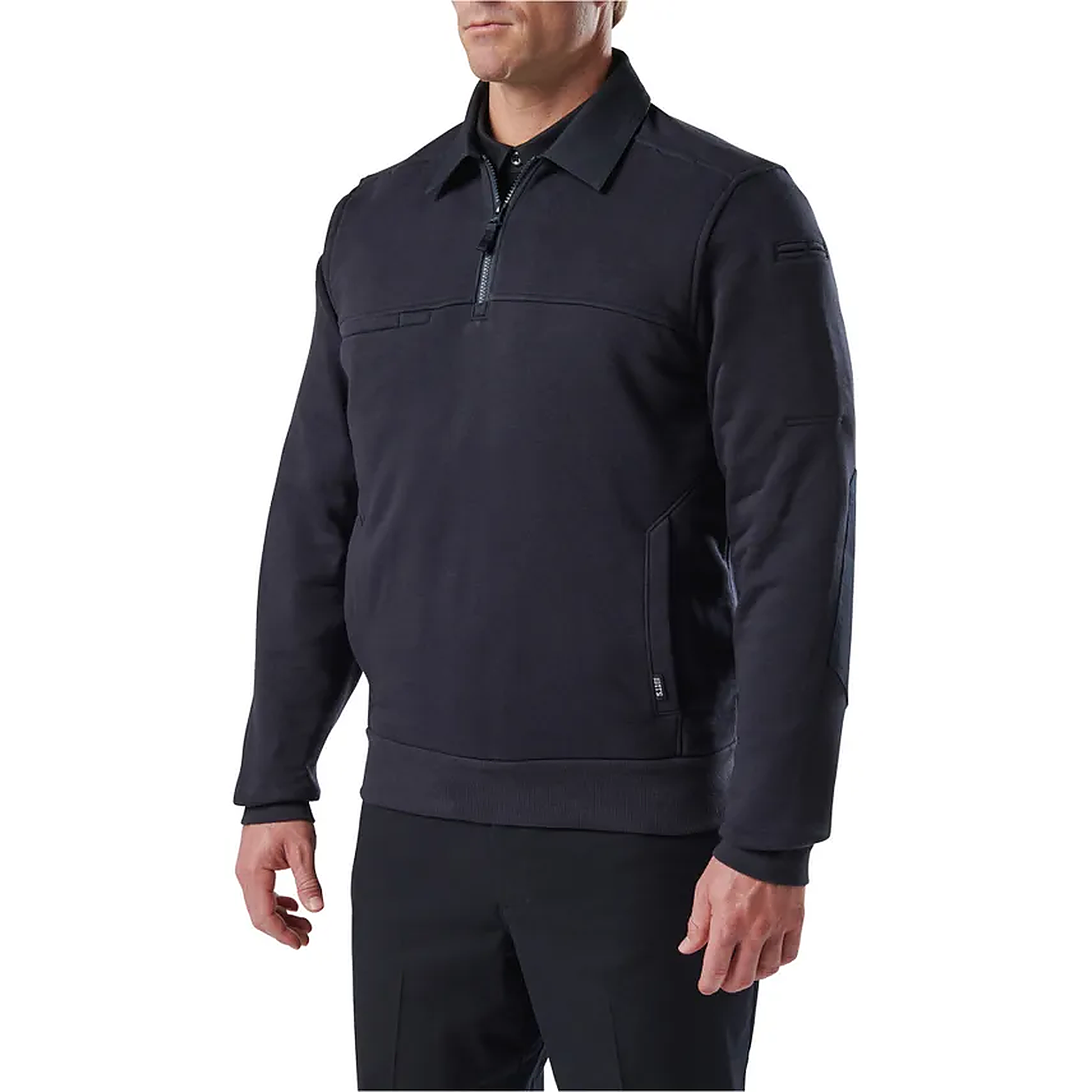 Front side-profile view of a model in the navy job shirt, highlighting the zippered side pocket and quarter-zip placket.