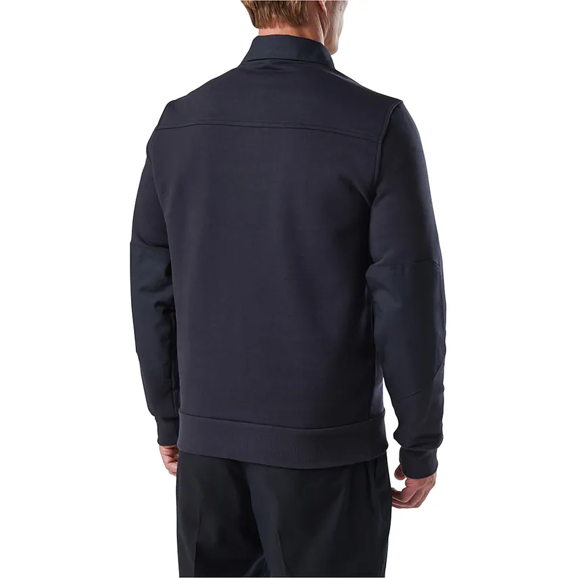 Full back view of a model wearing the plain navy 5.11 job shirt, showing the yoke seam and clean unprinted back.