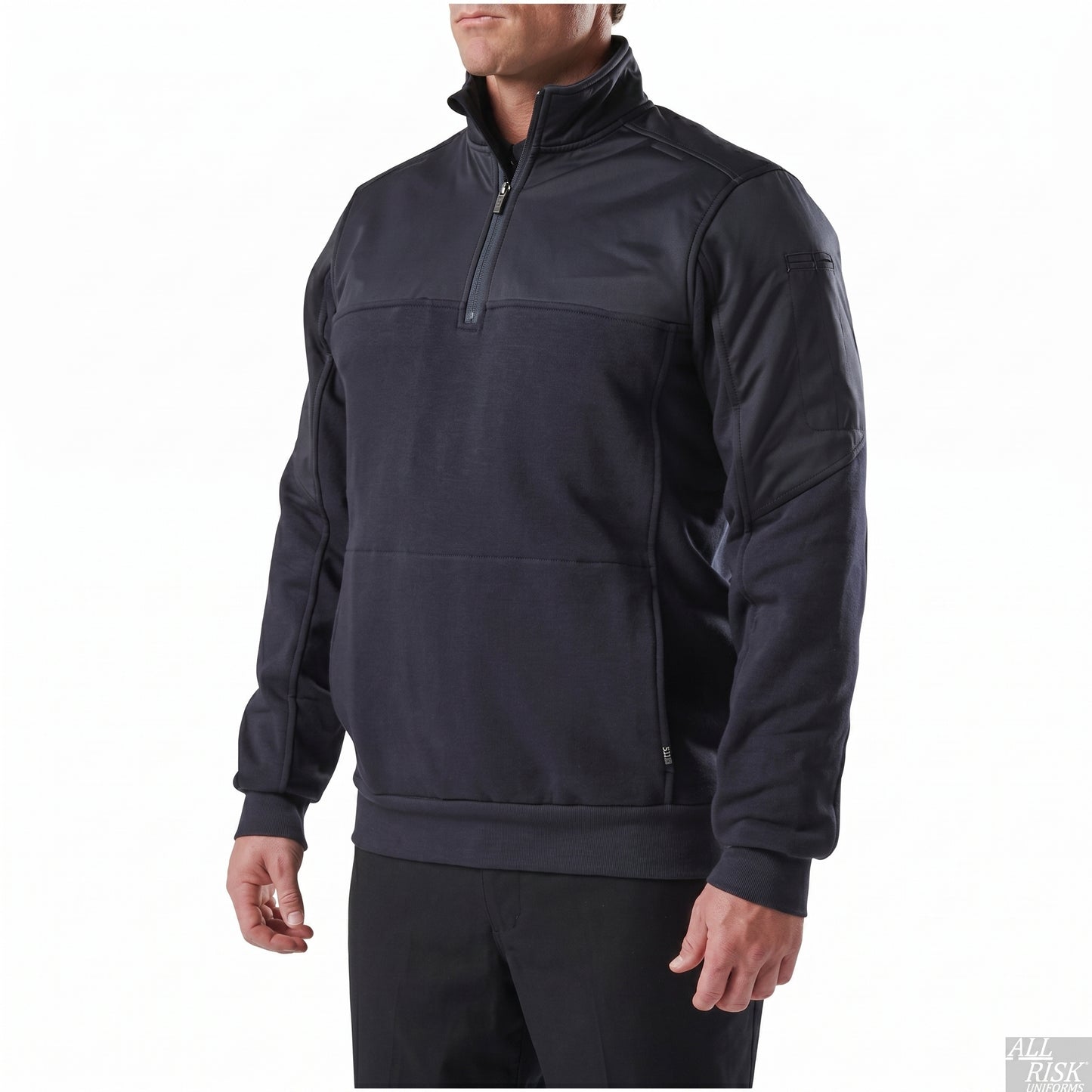 Three-quarter front view of the plain navy job shirt highlighting the half-zip placket, shoulder yoke and a low-profile zippered sleeve pocket.