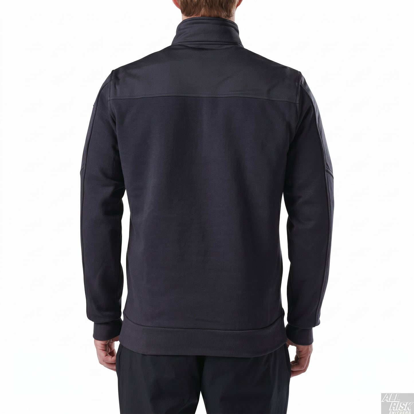 Back view of the plain navy quarter-zip job shirt showing the upper-back yoke seam, set-in sleeves and ribbed hem.