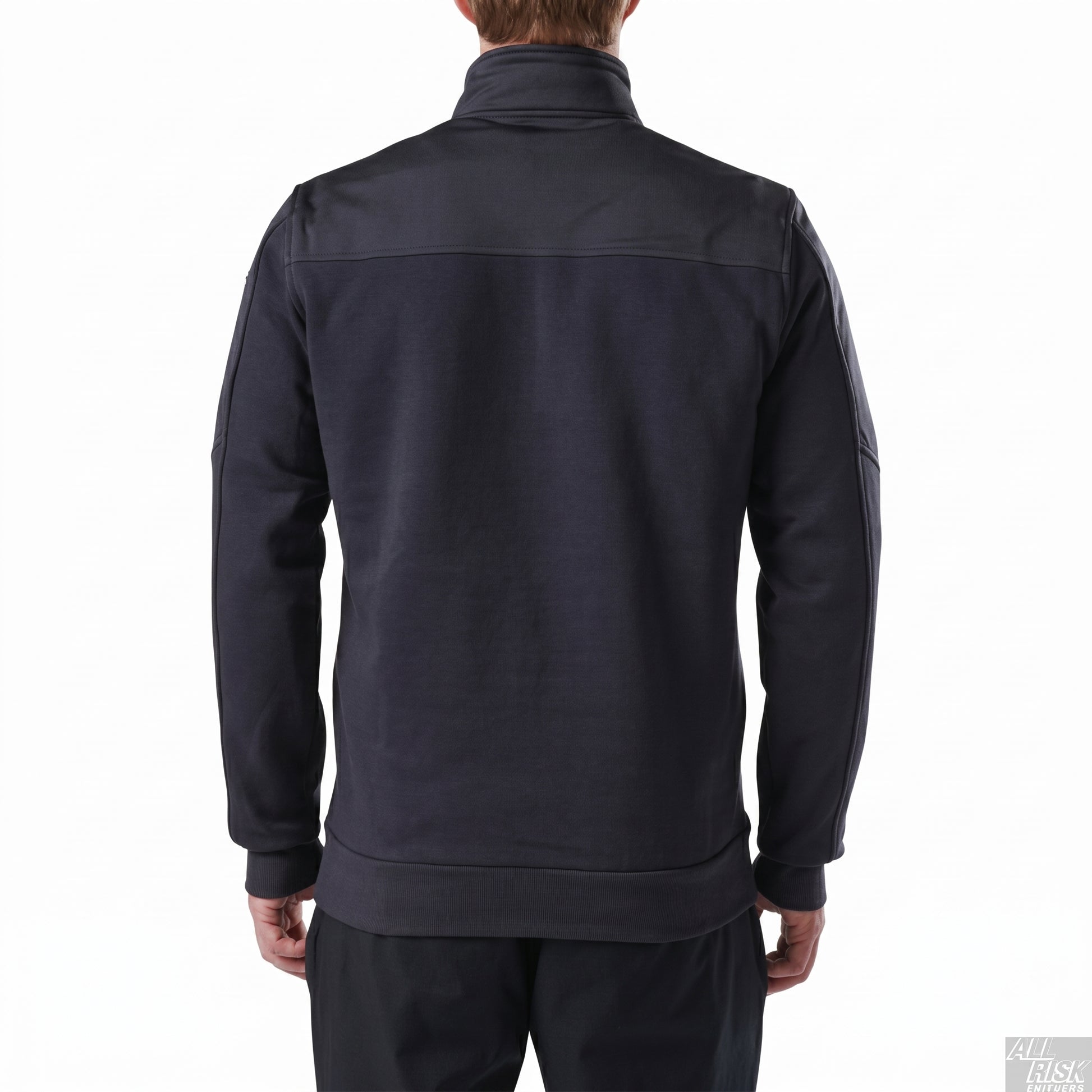 Back view of the plain navy quarter-zip job shirt showing the upper-back yoke seam, set-in sleeves and ribbed hem.