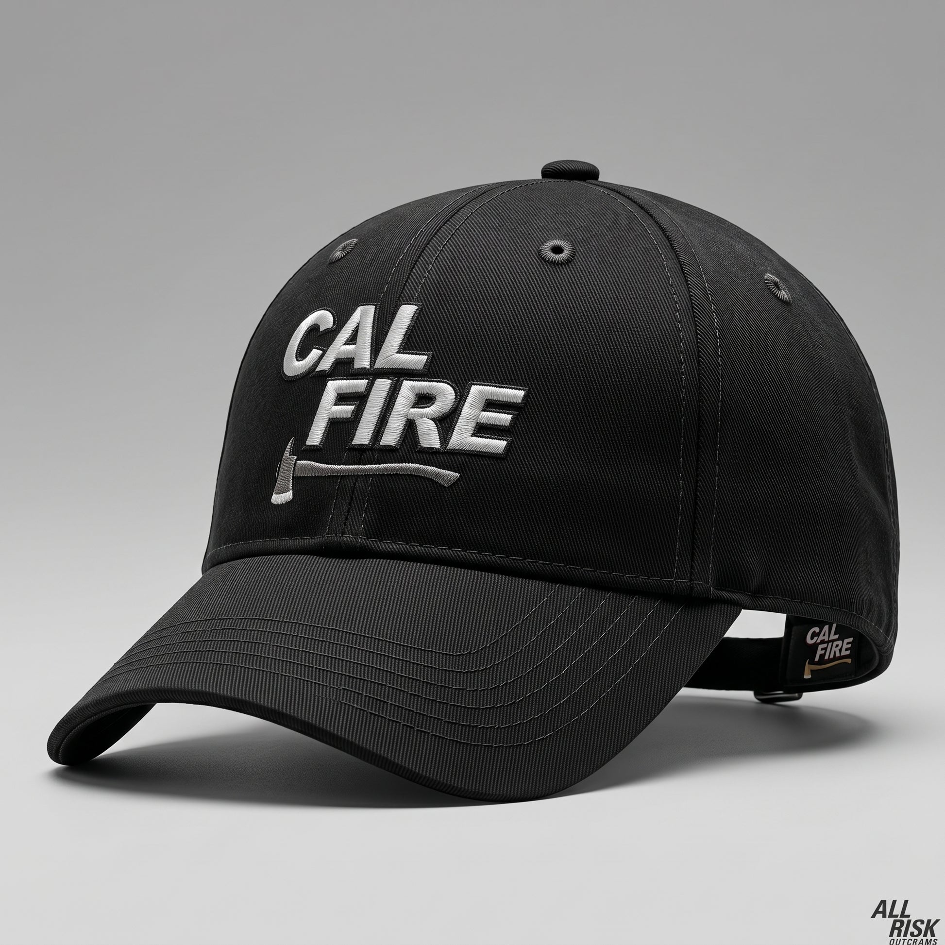 Black CAL FIRE Bucket Brigade cap render, three-quarter view with the white CAL FIRE wordmark above a horizontal axe and a CAL FIRE tab on the adjustment strap.