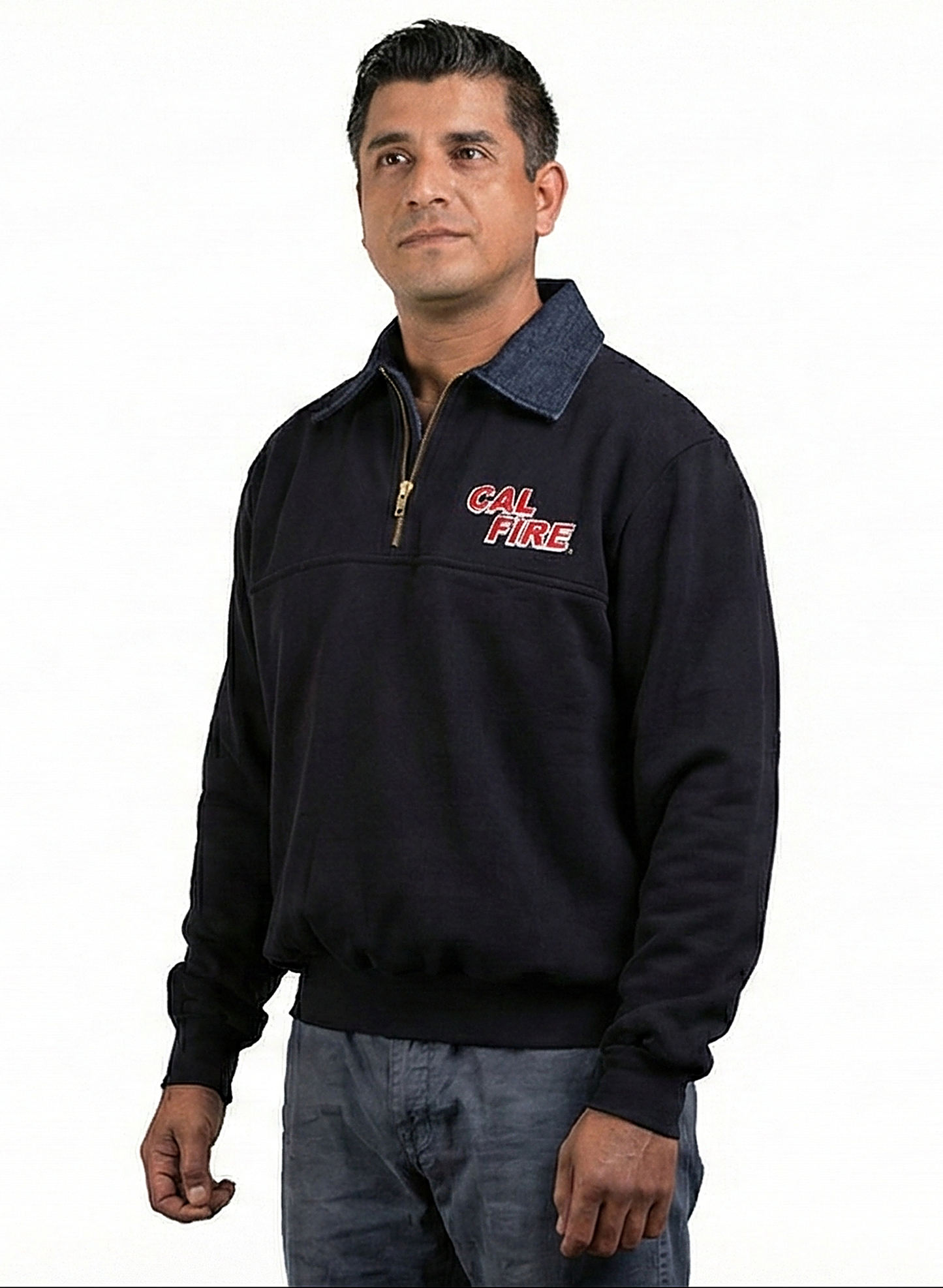 Male model in a three-quarter pose wearing the navy job shirt with the red CAL FIRE wordmark on the chest and denim collar up.