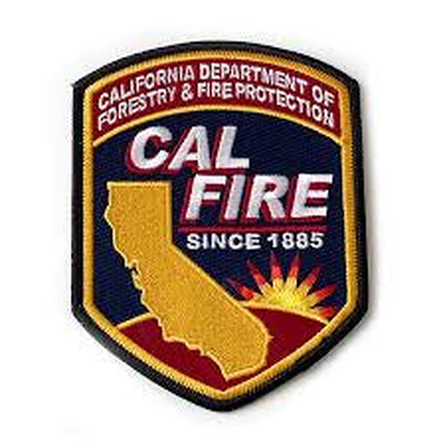 Three-quarter angled view of the embroidered CAL FIRE arrowhead patch on white, showing the stacked CAL FIRE wordmark, gold state outline, and sunrise.