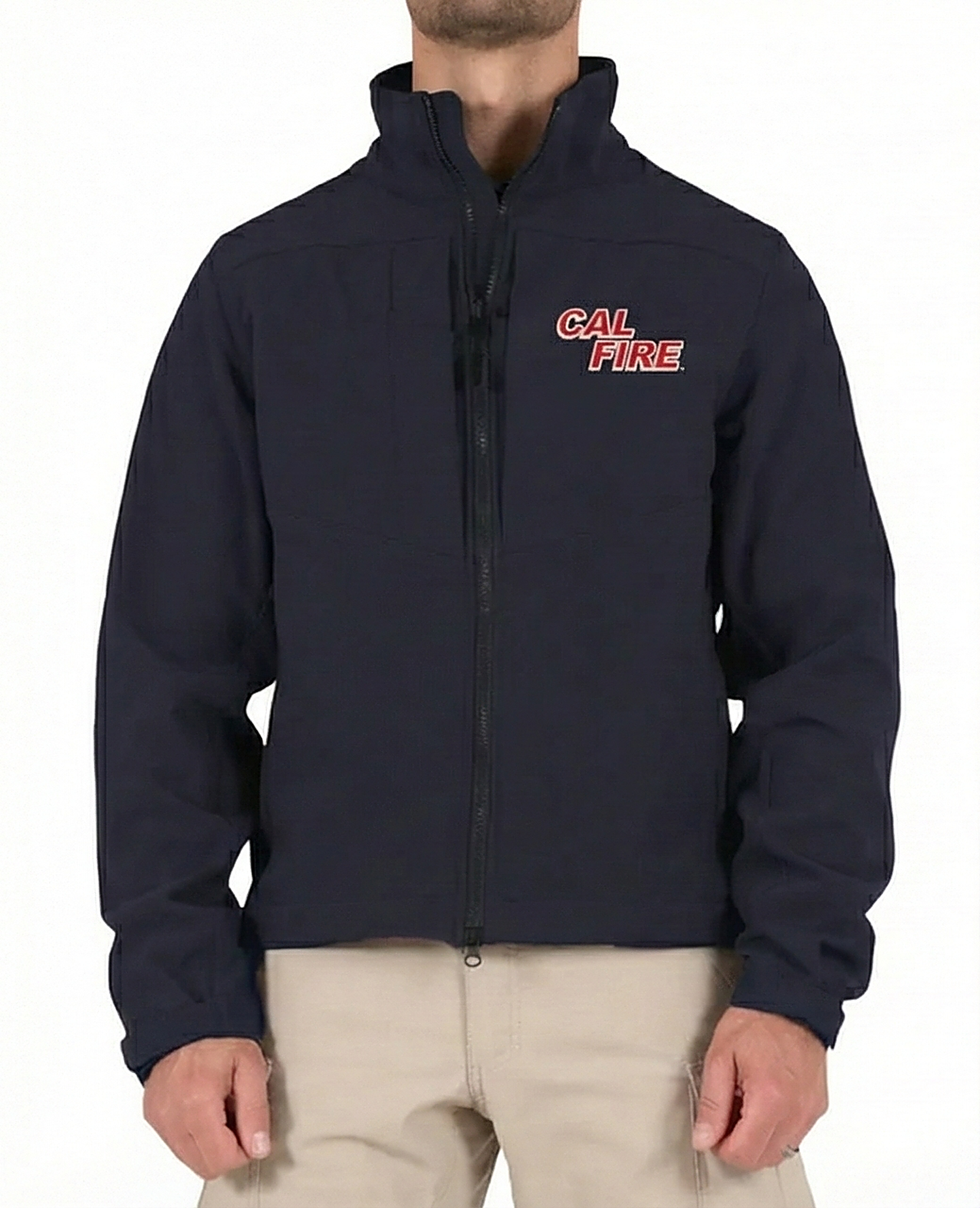 Model wearing the navy Tactix softshell jacket, front view with the red CAL FIRE wordmark on the left chest and khaki tactical pants.
