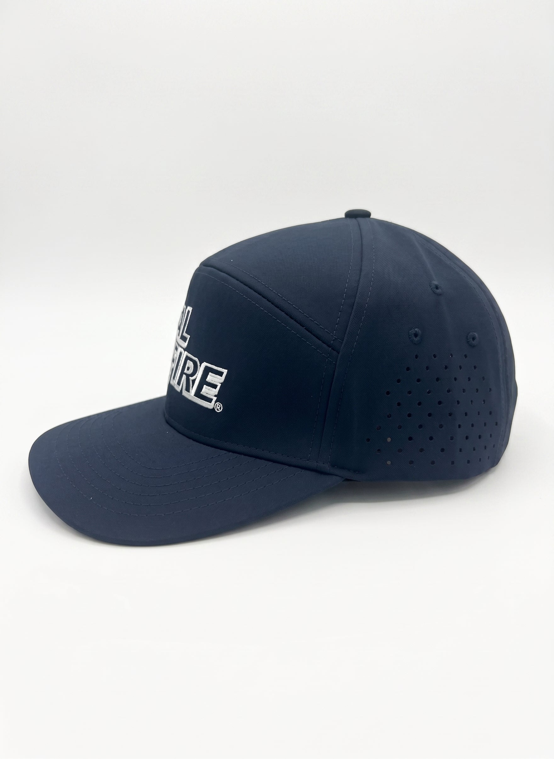 7 Panel Dome Athletic Hat in midnight navy with white CAL FIRE text - side angle view displaying dome shape and athletic construction