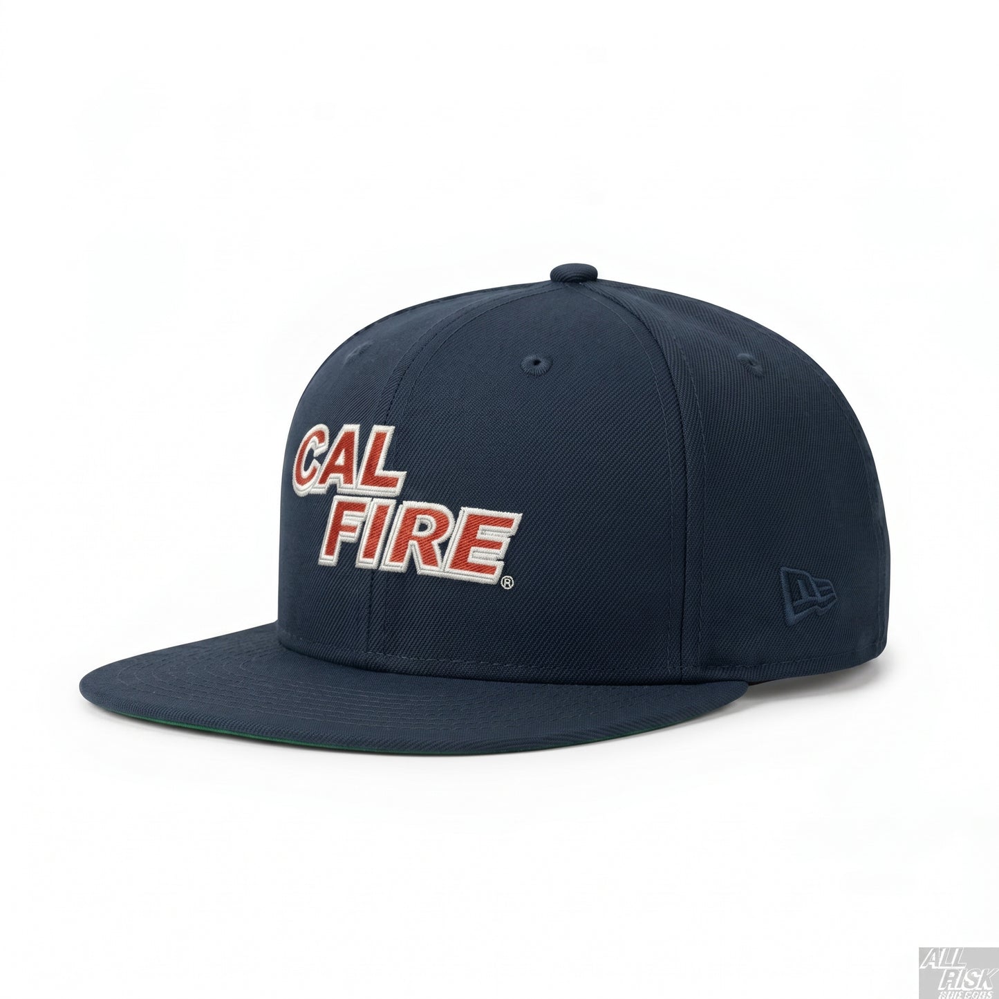 Navy snapback angled three-quarter view with the red CAL FIRE wordmark, a tonal navy New Era flag on the side, and a green undervisor.