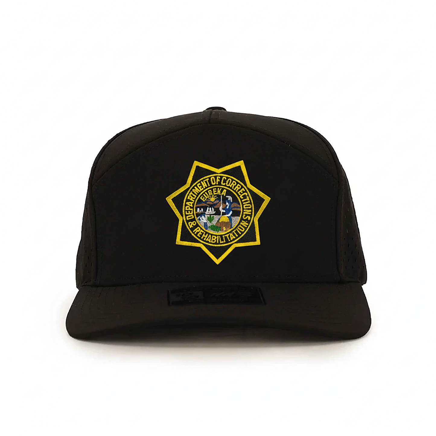 Black cap with a yellow emblem on a white background