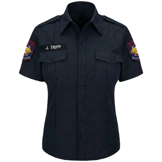 Dark blue shirt with patches and a name tag on a black background