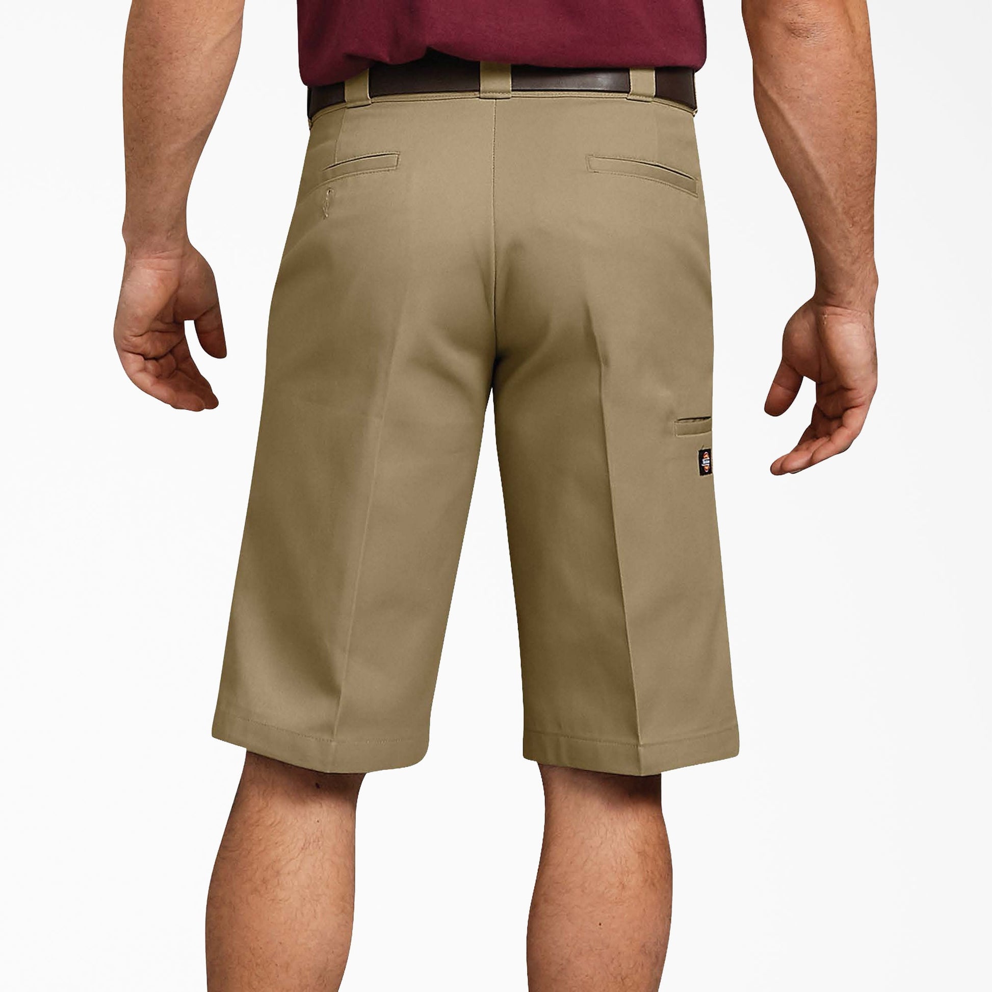 Back close-up of Dickies Khaki work shorts showing two welt back pockets and a side utility pocket
