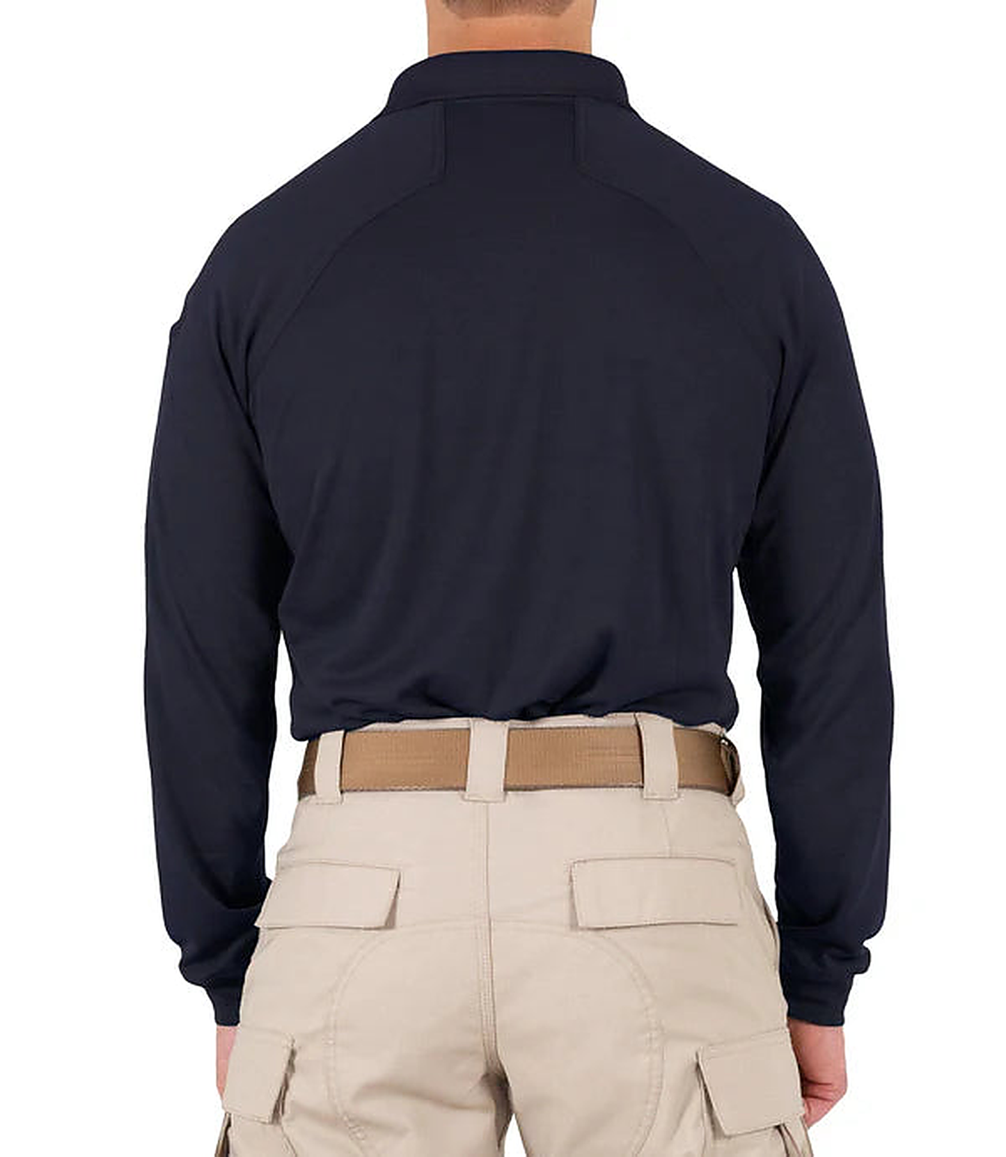 Model in straight back view wearing the navy long-sleeve performance polo over khaki tactical pants and a tan belt.