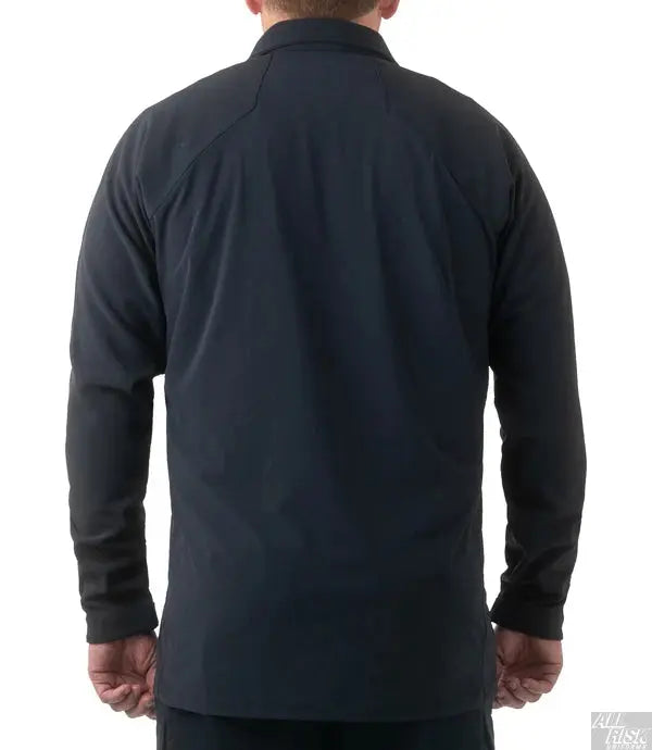 Black jacket worn by a person on a white background