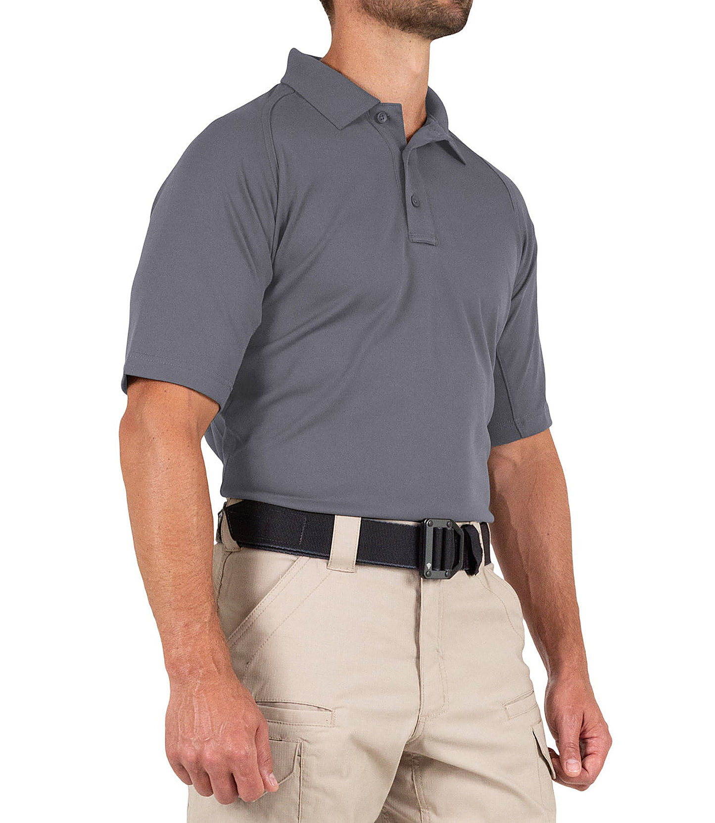 Man wearing a gray polo shirt and beige pants on a white background