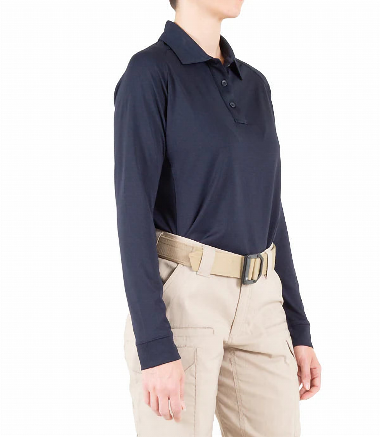 Side profile of a model wearing the plain navy long-sleeve polo with khaki tactical pants and a tan belt.