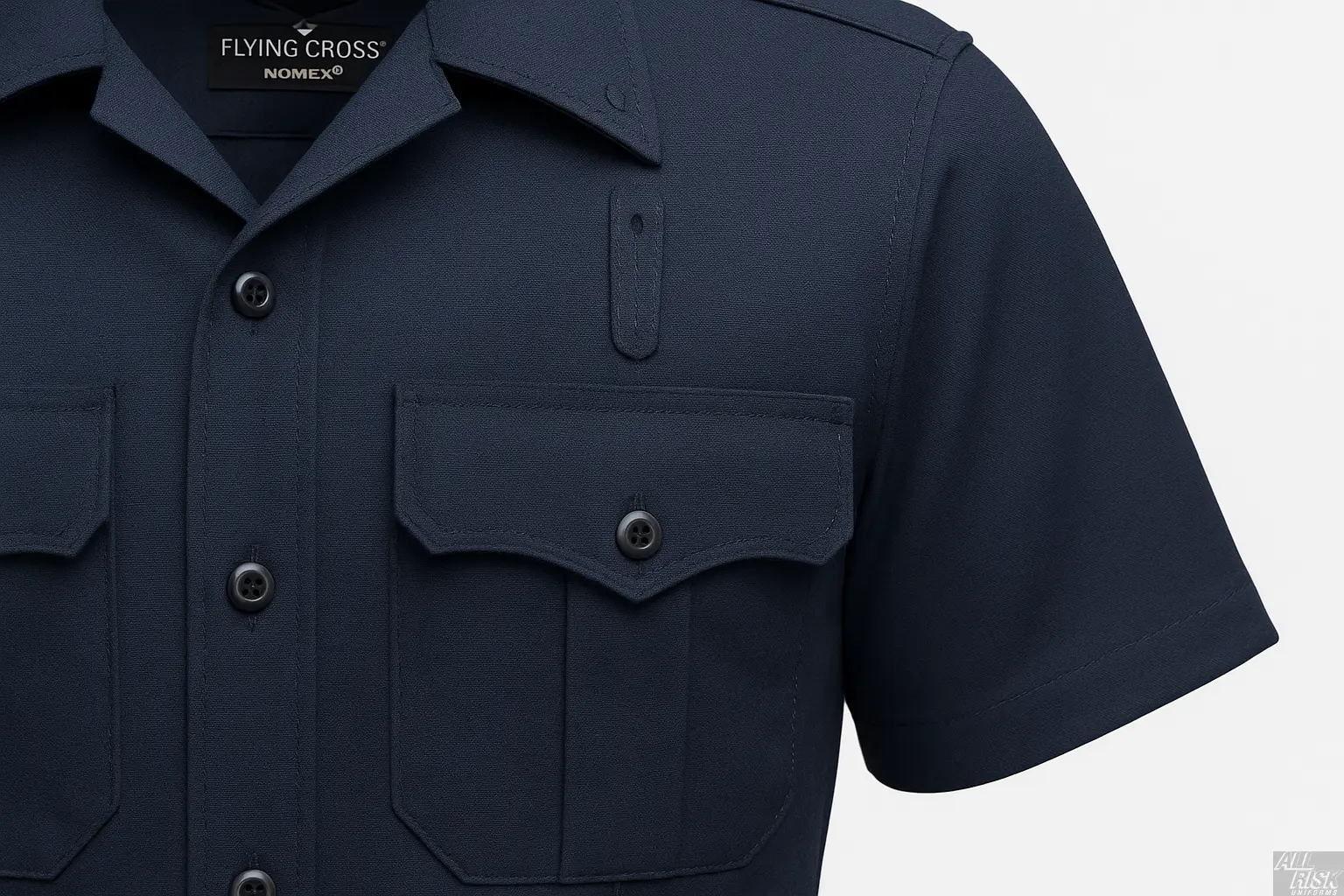 Close-up detail of Flying Cross Nomex Short Sleeve Shirt in midnight navy showing chest pocket with pointed flap, pencil opening, badge tab, and fire-resistant Nomex fabric texture
