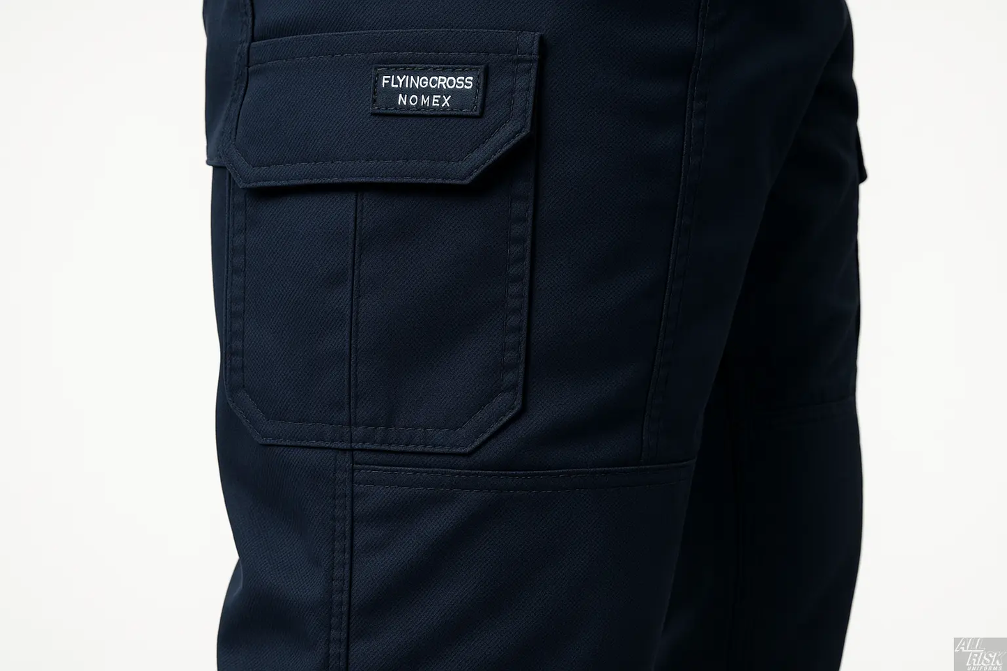 Close-up detail of Flying Cross Nomex Tactical Pants in midnight navy cargo pocket and reinforced knee area showing fire-resistant Nomex fabric texture and tactical construction