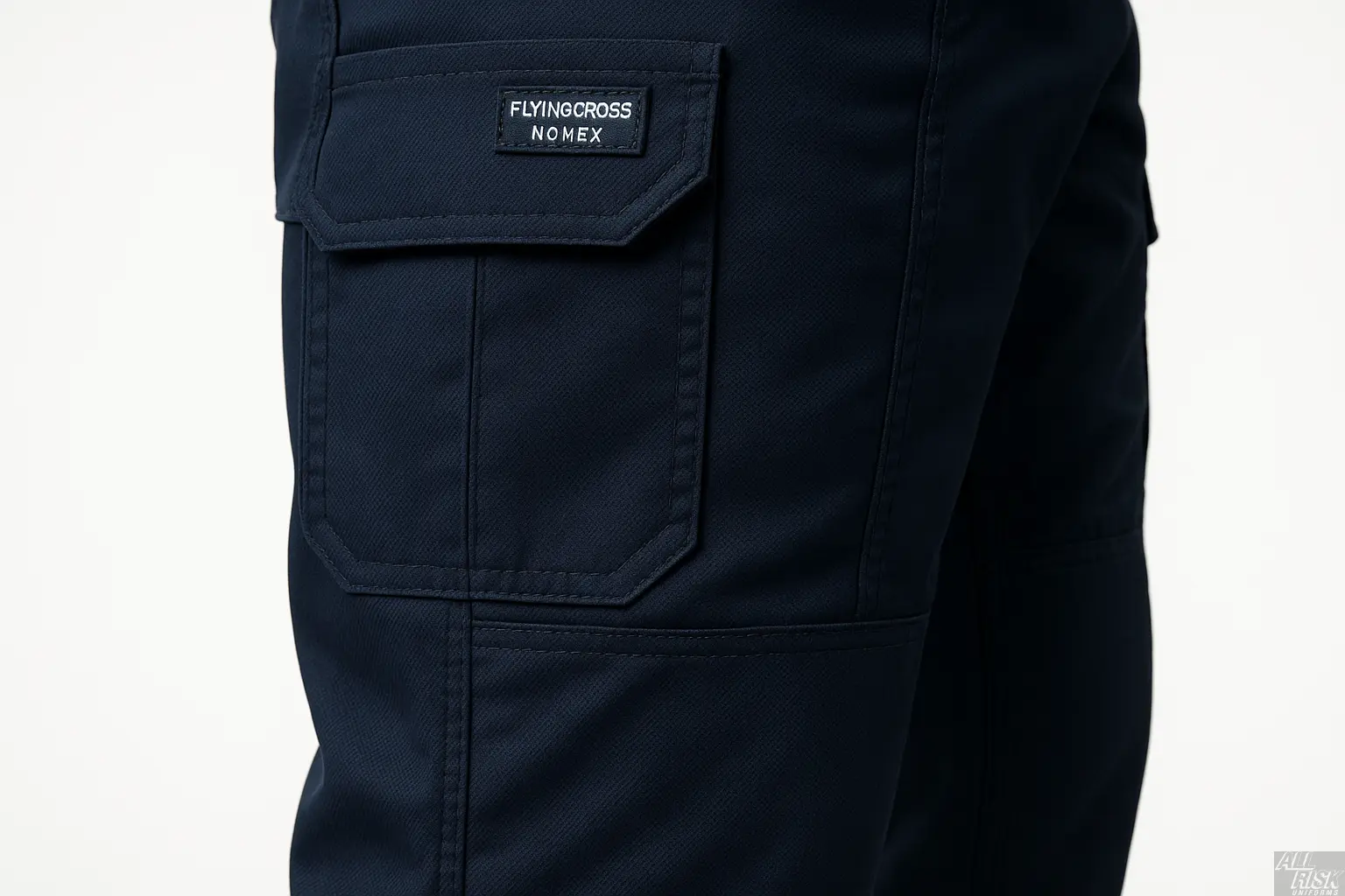 Close-up detail of Flying Cross Nomex Tactical Pants in midnight navy cargo pocket and reinforced knee area showing fire-resistant Nomex fabric texture and tactical construction