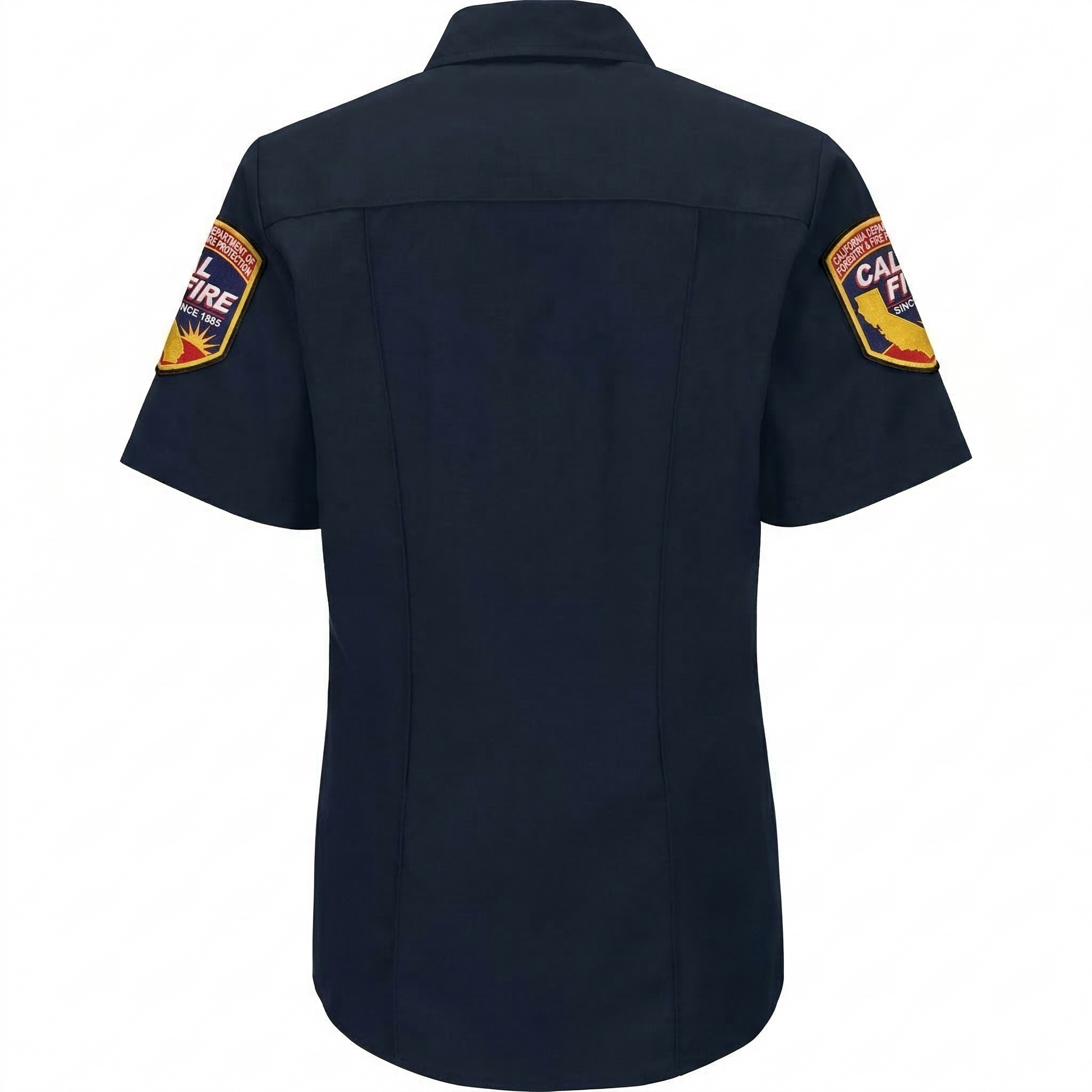 Back view on a model of the navy women's Nomex uniform shirt showing the plain yoke and the CAL FIRE arrowhead shield patches on both short sleeves.