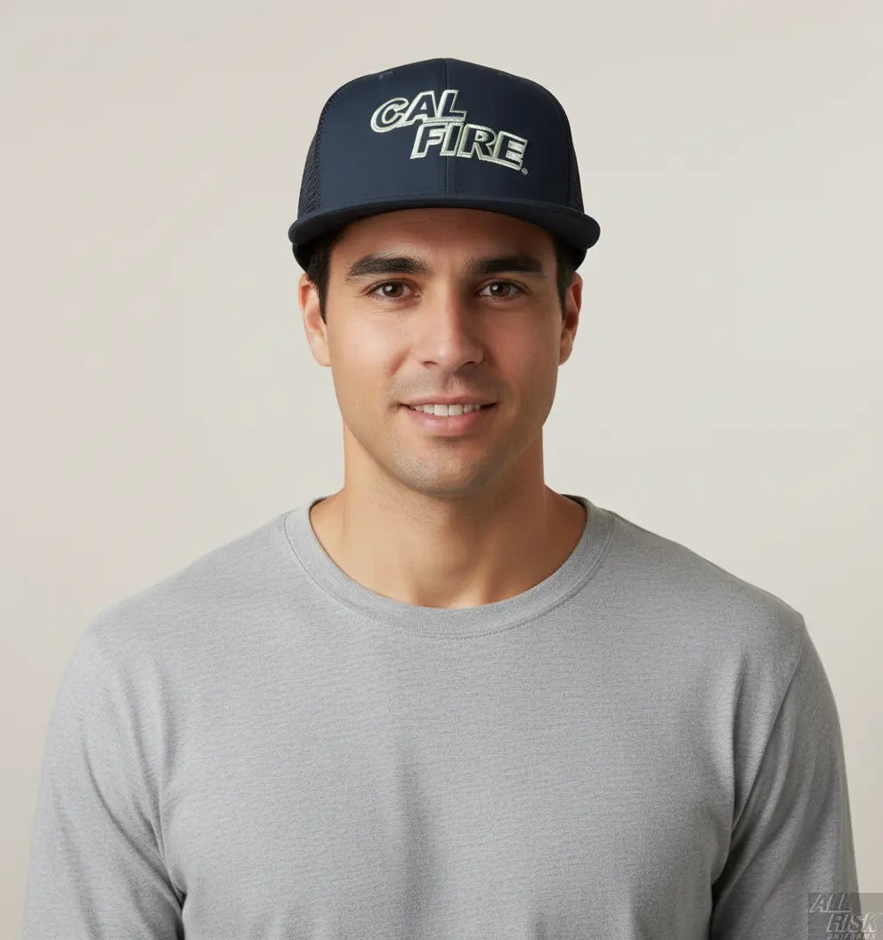 Person wearing New Era 403 Snapback Hat in midnight navy with white CAL FIRE text showing comfortable fit and flat bill style