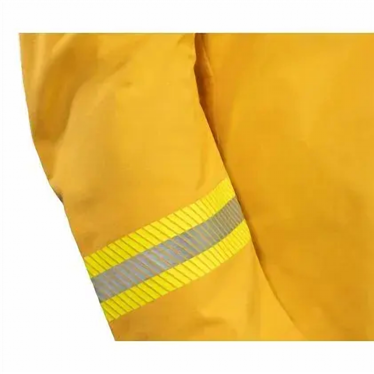 Close-up detail of the yellow Propper Nomex wildland jacket cuff — silver-and-yellow reflective trim band stitched to the sleeve.