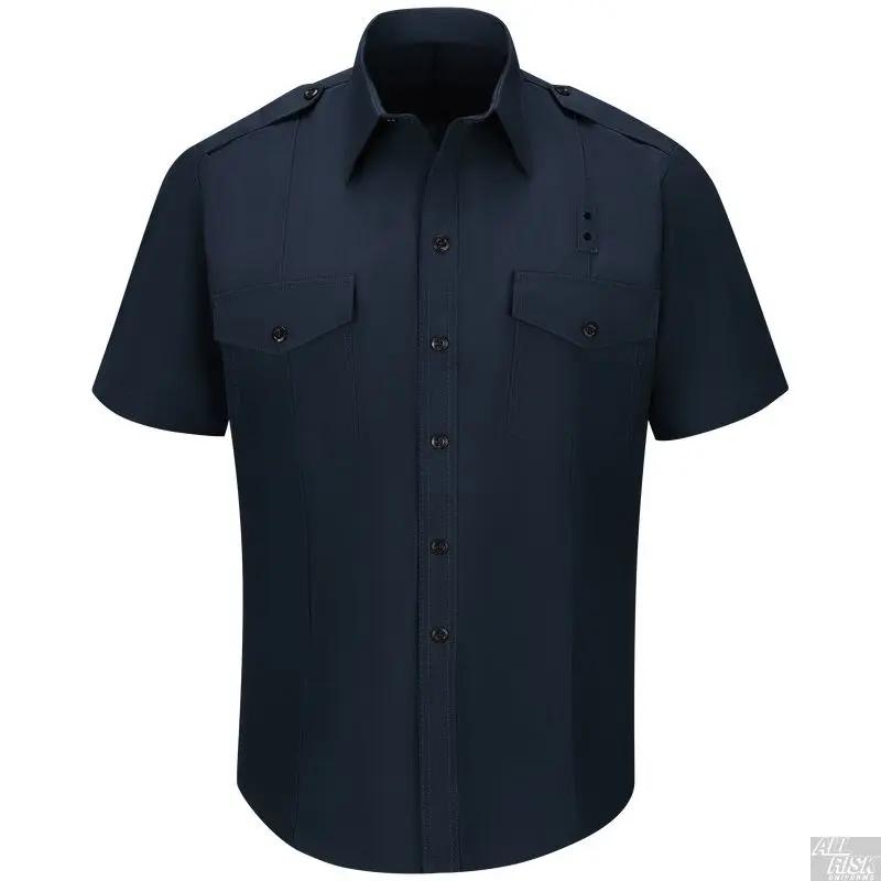Short-sleeve midnight navy firefighter shirt with CAL FIRE patches, sewn-in military creases, banded collar, pencil slot, badge tab, and hidden front snap closure.