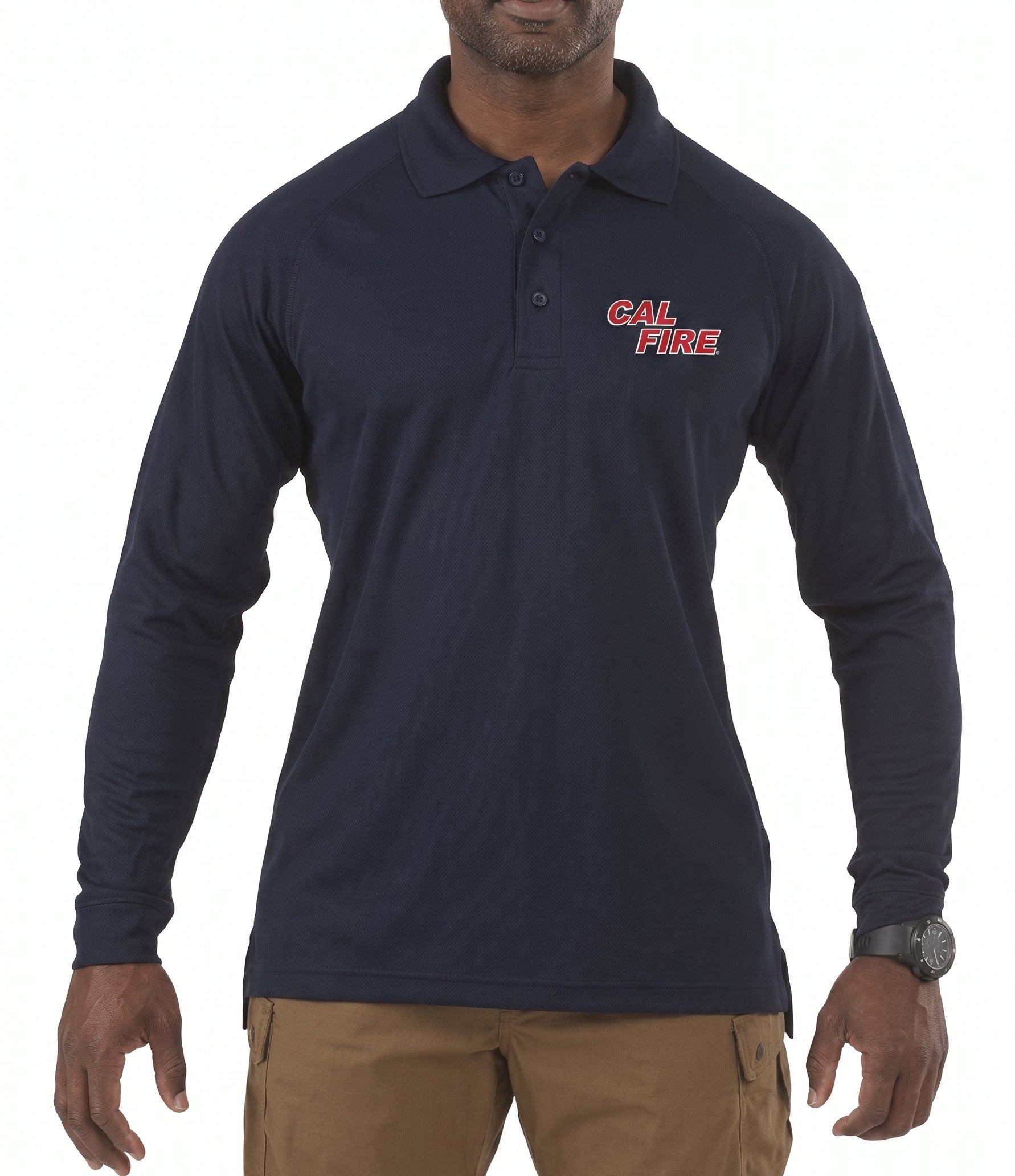 Model wearing the navy 5.11 performance long-sleeve polo with the red CAL FIRE wordmark on the left chest, paired with coyote-brown tactical pants.