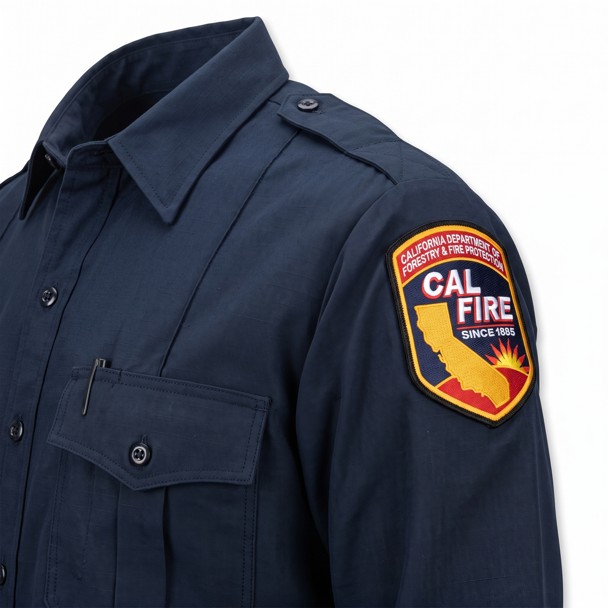 Angled detail of the CAL FIRE Mens Flying Cross Long Sleeve Nomex shirt showing the epaulet, shoulder patch and left chest pocket with pencil stall