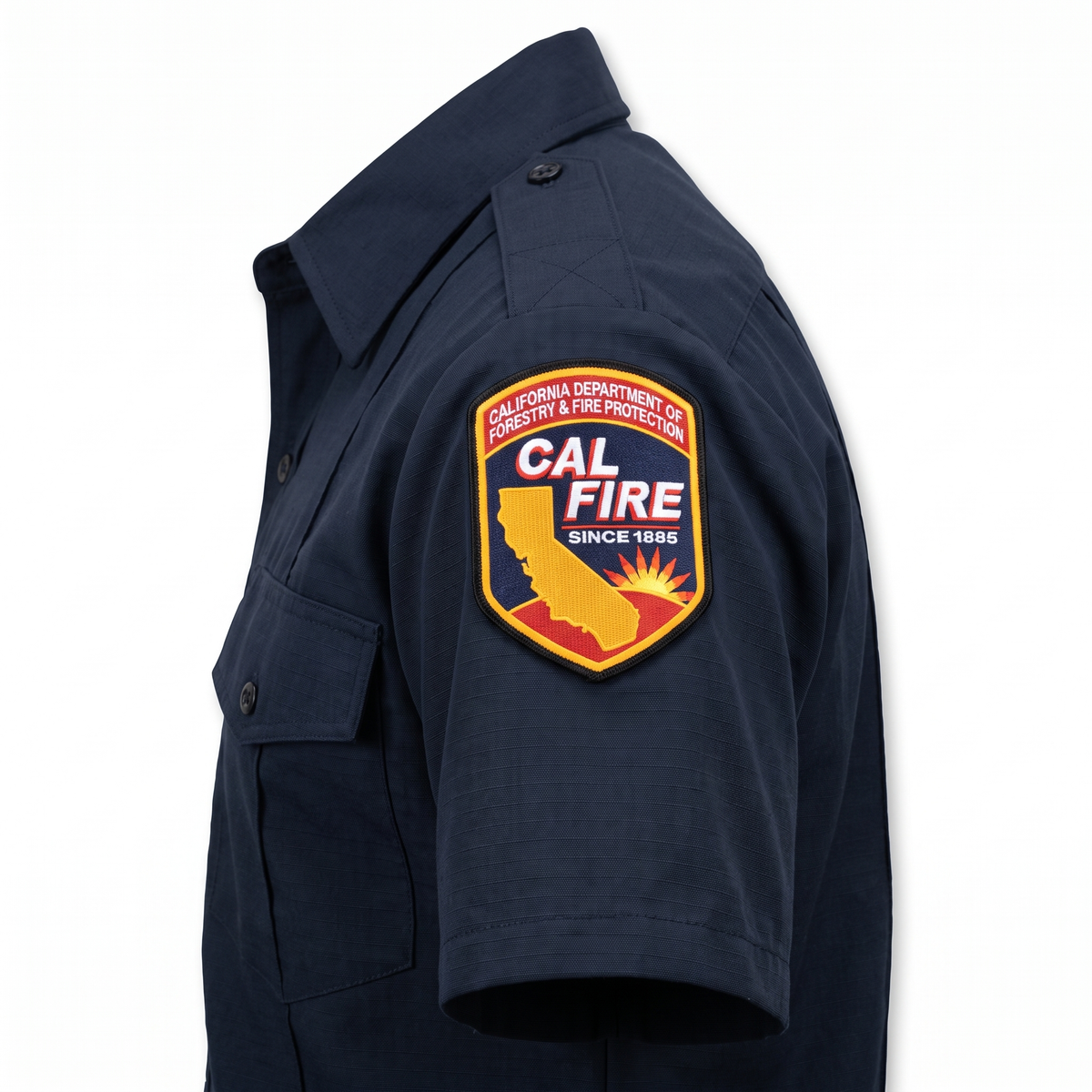 Close-up of the embroidered CAL FIRE shoulder patch on the sleeve of the Mens Flying Cross Short Sleeve Nomex shirt