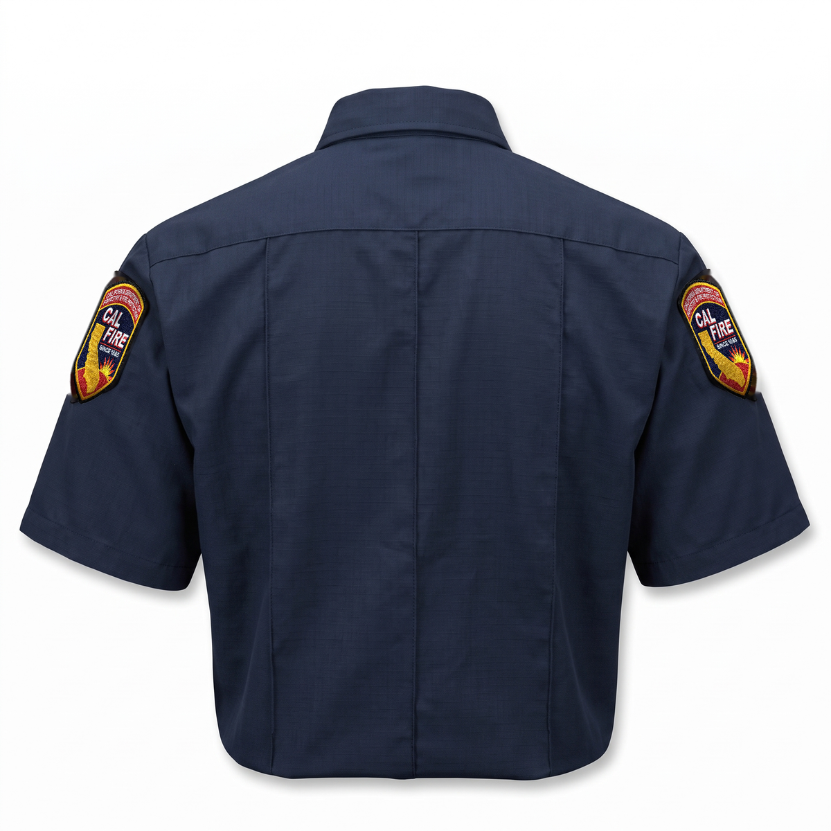 CAL FIRE Mens WorkRite Short Sleeve Nomex shirt, back view with sewn-in military creases and shoulder patches on both sleeves