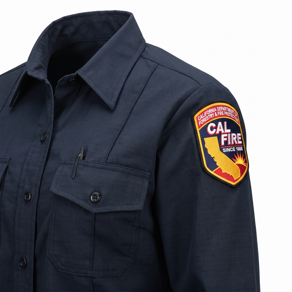 Angled detail of the CAL FIRE Womens WorkRite Long Sleeve Nomex shirt showing the shoulder patch, collar and left chest pocket
