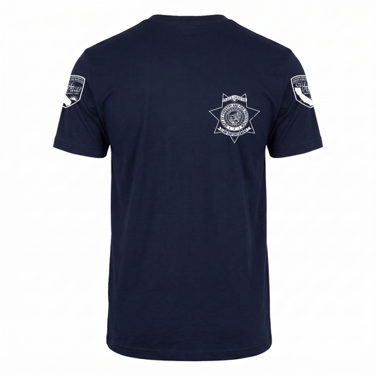 Navy DFND flame-resistant short-sleeve CAL FIRE Law Enforcement shirt, front view, with the white CAL FIRE Peace Officer seven-point star badge on the left chest and a CAL FIRE shield on each shoulder