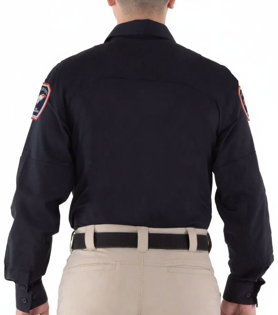 First Tactical long sleeve shirt worn with Siskiyous Fire Technology shoulder patches - front angle
