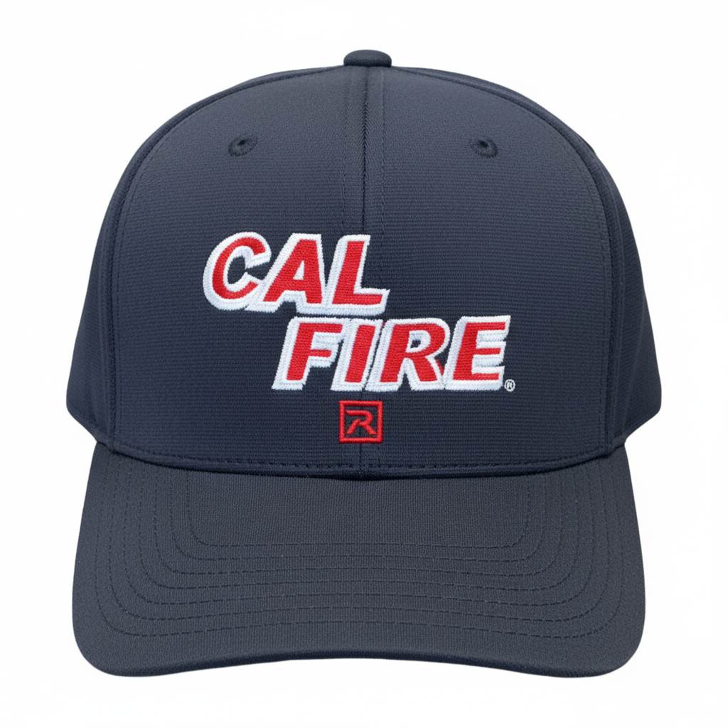 Close-up detail of Richardson PTS 20 Snapback Hat in midnight navy showing red CAL FIRE text embroidery and Pulse R-Flex fabric texture