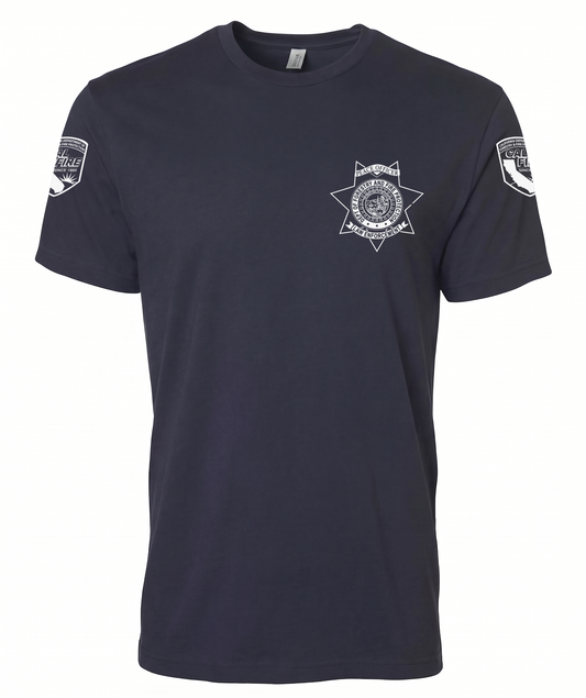 Navy Independent Trading lightweight short-sleeve CAL FIRE Law Enforcement shirt, front view, with the white CAL FIRE Peace Officer seven-point star badge on the left chest and a CAL FIRE shield on each shoulder
