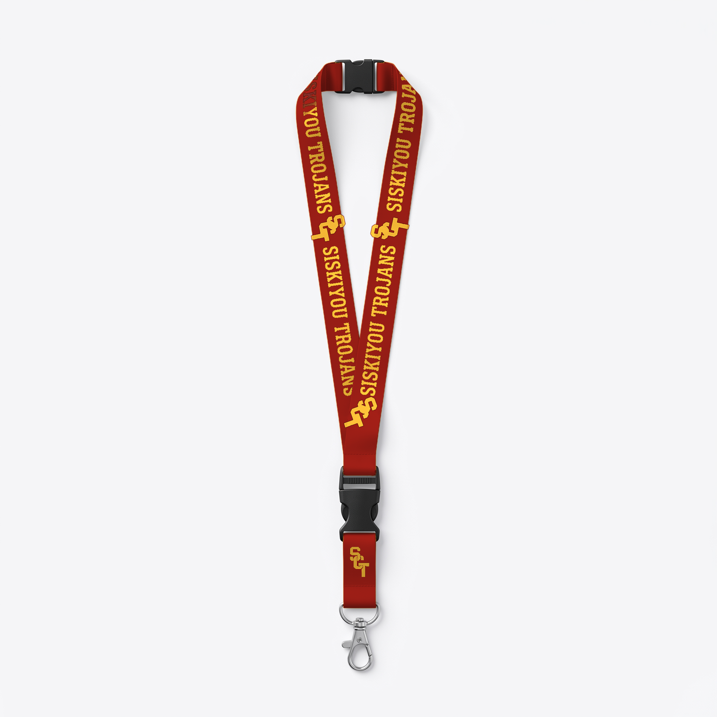 Siskiyou Trojans reversible lanyard, cardinal side showing gold SCT monogram and SISKIYOU TROJANS wordmark