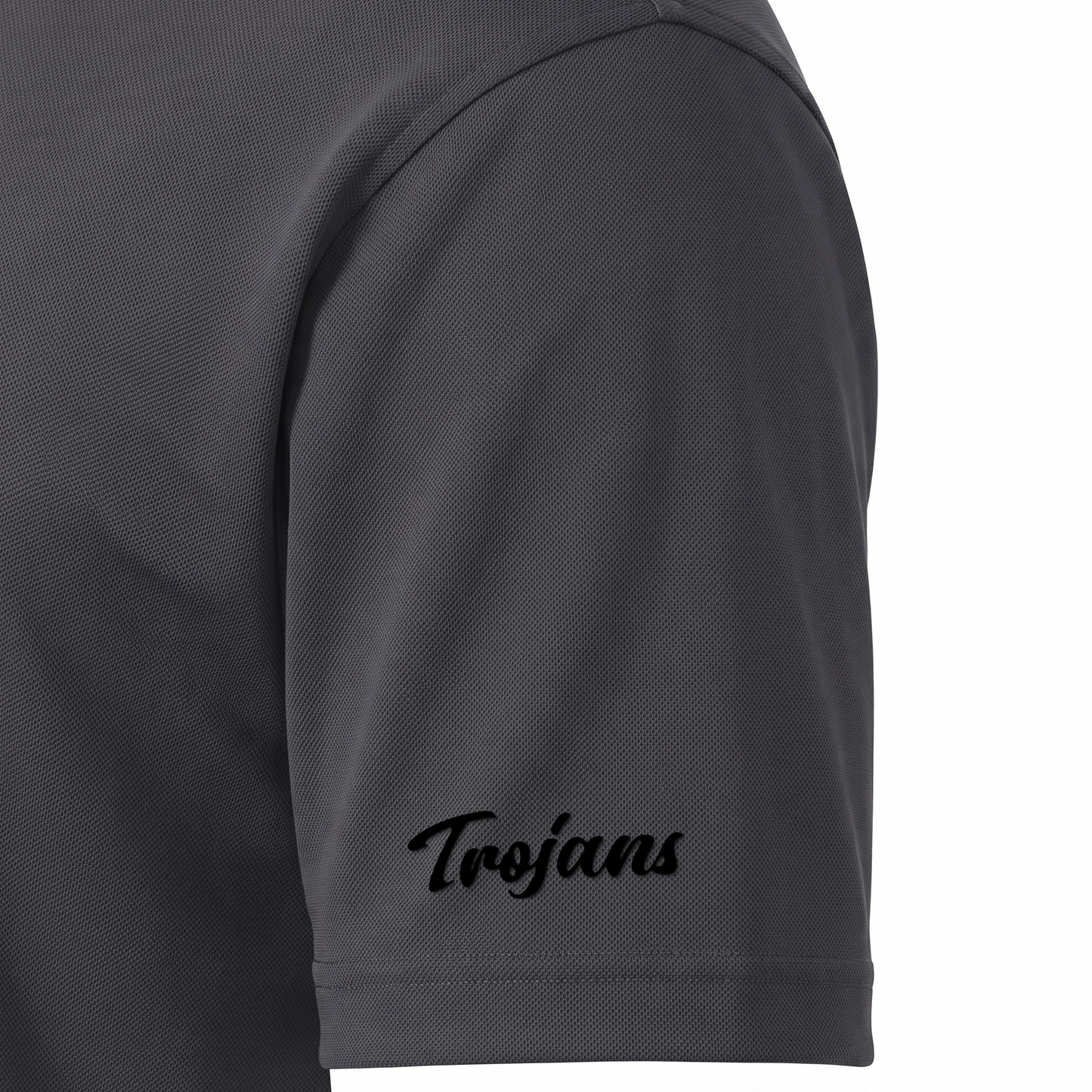 Siskiyou Trojans men's Sport-Tek polo in iron grey, close-up of the right sleeve showing the Trojans script in black embroidered just above the sleeve hem